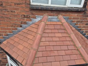 New roof tiles with professional dry ridge installation on Leeds residential property