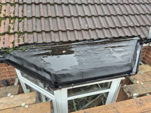 Flat roof repair on a bay window with new waterproof membrane installed by CL Stewart Roofing